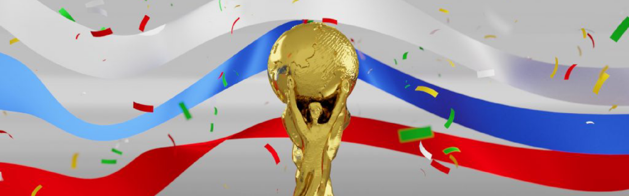 Los viajes de empresa a la Copa del Mundo van más allá de llegar a ella 6 Imagen de portada para el post de Copa del Mundo. Muestra la copa de los mundiales FIFA y detrás colores del país anfitrión en este caso Estados Unidos
